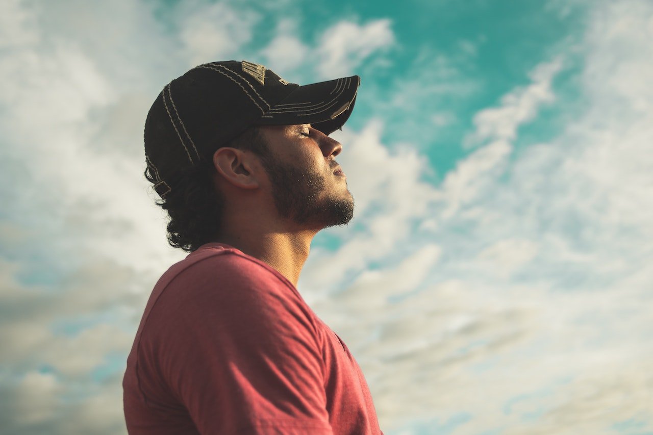 man-breathing-deeply-outdoors-somatic-coaching
